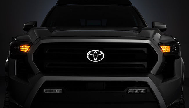 Genuine Toyota 2024+ Tacoma Dark Chrome Illuminated Front Emblem  PT413-35242 PT41335242